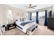 Spacious bedroom with king-size bed and ample natural light at 9392 Anvil St, Arvada, CO 80007
