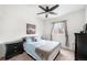 Comfortable guest bedroom with a queen bed and window coverings at 9392 Anvil St, Arvada, CO 80007