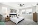 Spacious primary bedroom with a king-size bed and plenty of natural light at 9392 Anvil St, Arvada, CO 80007