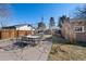 Spacious backyard with a stone patio, perfect for outdoor dining and entertaining at 772 Garfield St, Denver, CO 80206