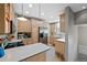 Bright kitchen featuring ample wood cabinetry, stainless steel appliances, and tiled flooring at 772 Garfield St, Denver, CO 80206