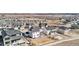 Captivating aerial shot showcasing the property's prime location within a vibrant community with scenic mountain views at 5381 Hickory Oaks Trl, Castle Rock, CO 80104