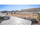Spacious backyard with a stone patio, offering peaceful views of the surrounding area at 5381 Hickory Oaks Trl, Castle Rock, CO 80104