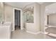 Tiled bathroom features a glass shower and modern vanity at 5381 Hickory Oaks Trl, Castle Rock, CO 80104