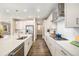 Bright kitchen featuring stainless steel appliances and white cabinets at 5381 Hickory Oaks Trl, Castle Rock, CO 80104