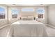 Well-lit main bedroom with large windows offering plenty of natural light at 5381 Hickory Oaks Trl, Castle Rock, CO 80104