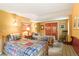 Bedroom with two twin beds, wood accents, and a rocking chair at 207 Kelly E Rd, Boulder, CO 80302