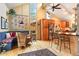 Breakfast nook with built-in seating, wicker chairs, and views from large windows at 207 Kelly E Rd, Boulder, CO 80302