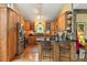 Well-equipped kitchen with wooden cabinetry, stainless steel appliances, breakfast bar with seating at 207 Kelly E Rd, Boulder, CO 80302