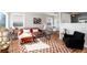 Bright living room with cozy seating, modern decor, and plentiful natural light at 1941 Wabash St, Denver, CO 80220