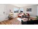 Inviting living room featuring stylish furniture, large windows, and contemporary design at 1941 Wabash St, Denver, CO 80220