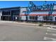 The Stanley Marketplace building featuring modern architecture and outdoor dining space at 1941 Wabash St, Denver, CO 80220