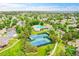 Aerial view of a neighborhood featuring tennis courts and a community pool at 20145 E Fair Ln, Centennial, CO 80016