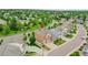 Home in a suburban setting with well-maintained landscaping, a view of the surrounding neighborhood, and mature trees at 20145 E Fair Ln, Centennial, CO 80016