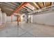 Unfinished basement with exposed ceiling, utility equipment, and ample open space at 20145 E Fair Ln, Centennial, CO 80016