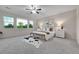 Spacious primary bedroom with ample natural light, a ceiling fan and neutral decor at 20145 E Fair Ln, Centennial, CO 80016
