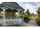 Charming community gazebo with architectural details surrounded by greenery and a walking path at 20145 E Fair Ln, Centennial, CO 80016