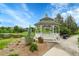 White gazebo located near a pond, perfect for relaxation at 20145 E Fair Ln, Centennial, CO 80016
