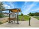 Piney Creek trailhead with benches, signage, and a scenic path at 20145 E Fair Ln, Centennial, CO 80016