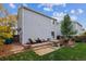 Private backyard with patio and sand area at 1255 Finch Ave, Brighton, CO 80601