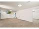 Unfurnished basement with an open layout and carpet flooring at 2415 E Maplewood Ave, Centennial, CO 80121