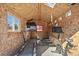 Interior view of finished shed used as home gym with treadmill and stationary bike at 2415 E Maplewood Ave, Centennial, CO 80121