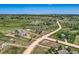 An aerial view of the house, surrounding acreage, and outbuildings at 36023 Winchester Rd, Elizabeth, CO 80107