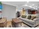Basement living room with comfortable seating, wood accents, and open layout at 36023 Winchester Rd, Elizabeth, CO 80107