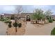 A charming community clubhouse with well-manicured landscaping and inviting walkway at 4784 Raven Run, Broomfield, CO 80023