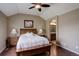Main bedroom with ensuite bathroom and vaulted ceilings at 4784 Raven Run, Broomfield, CO 80023