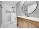 Modern bathroom with walk-in shower and sleek vanity at 9585 Brentwood Way # D, Westminster, CO 80021