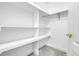 Walk-in closet featuring built-in shelving at 9585 Brentwood Way # D, Westminster, CO 80021