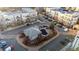 Aerial view of community pool, clubhouse and parking, highlighting amenities and convenient parking at 5677 S Park Pl # C208, Englewood, CO 80111
