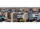 Panoramic cityscape view featuring a skyline of buildings with greenery surrounding them at 5677 S Park Pl # C208, Englewood, CO 80111