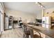 Open living space with an eat-in kitchen, desk, and sitting area. Great for entertaining and day to day living at 5677 S Park Pl # C208, Englewood, CO 80111