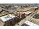 Urban neighborhood aerial shot featuring a mix of residential, commercial buildings, and transportation infrastructure at 2245 Blake St # C, Denver, CO 80205