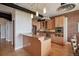 Bright kitchen with modern cabinets, stainless steel appliances, and granite countertops at 2245 Blake St # C, Denver, CO 80205