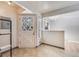 Front entry with a charming Dutch door and tile flooring at 5610 E Amherst Ave, Denver, CO 80222