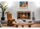 Cozy fireplace with hearth, with decorative elements, surrounded by stylish furniture and decor at 3001 S Josephine St, Denver, CO 80210