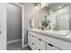 Elegant bathroom with double vanity and separate toilet at 6771 Canosa St, Denver, CO 80221