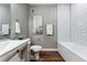 Bathroom with white subway tile, a bathtub, and a vanity at 6771 Canosa St, Denver, CO 80221