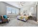 Bright bedroom with large window and ceiling fan at 6771 Canosa St, Denver, CO 80221