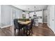 Modern kitchen with white cabinets, stainless steel appliances, and an island at 6771 Canosa St, Denver, CO 80221