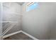 Large walk-in closet with double hanging rods at 6771 Canosa St, Denver, CO 80221
