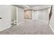 Finished basement features climbing wall, a half bath, and two doors at 60 Stewart Way, Erie, CO 80516