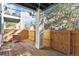 Spacious wooden back deck offering privacy with a fenced perimeter and outdoor space with access to surrounding greenery at 2796 Newport Cir, Castle Rock, CO 80104