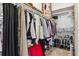 Walk-in closet with ample hanging space, shelving, and shoe storage at 2796 Newport Cir, Castle Rock, CO 80104