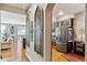 Hallway with hardwood floors leading to kitchen and living room at 2796 Newport Cir, Castle Rock, CO 80104