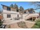 Spacious backyard with a patio and outdoor dining set, great for entertaining and enjoying the outdoors at 10858 E Harvard Dr, Aurora, CO 80014