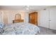 Bedroom with carpeted floors, a ceiling fan, a dresser, and closet at 10858 E Harvard Dr, Aurora, CO 80014